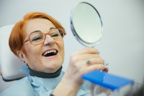 Broken Dentures: When To Get Them Replaced